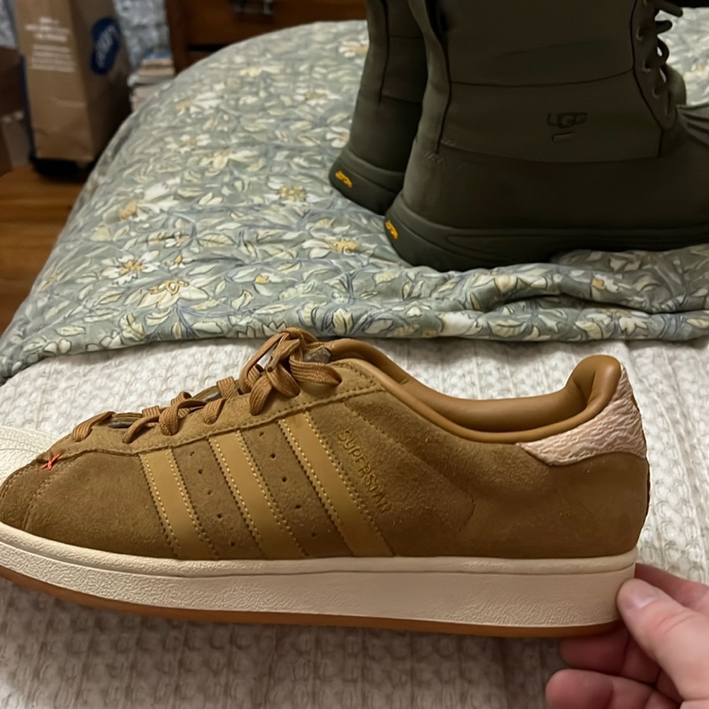 Adidas size 12 retro tennis shoes. Worn lightly. Good condition